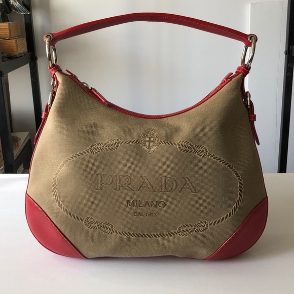 Prada Handbags - Prada Canada canvas and leather trimmed hobo bag